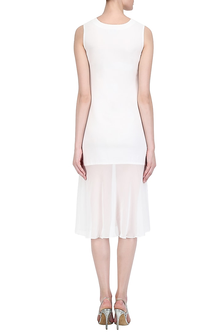 White floral embroidered drop waist dress available only at Pernia's Pop Up Shop.