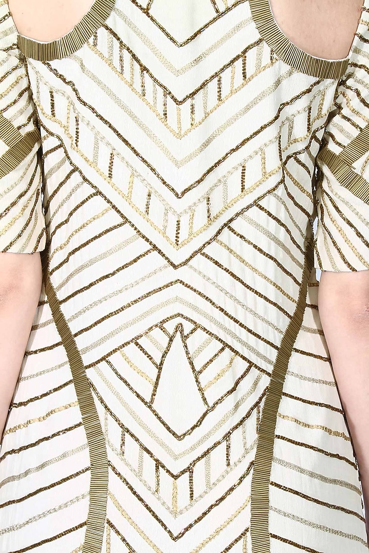 Creme and gold embellished cut out shoulder dress available only at Pernia's Pop Up Shop