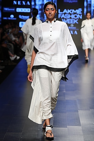 Off White Striped Fitted Trouser Pants With Attached Flare by Sayantan Sarkar