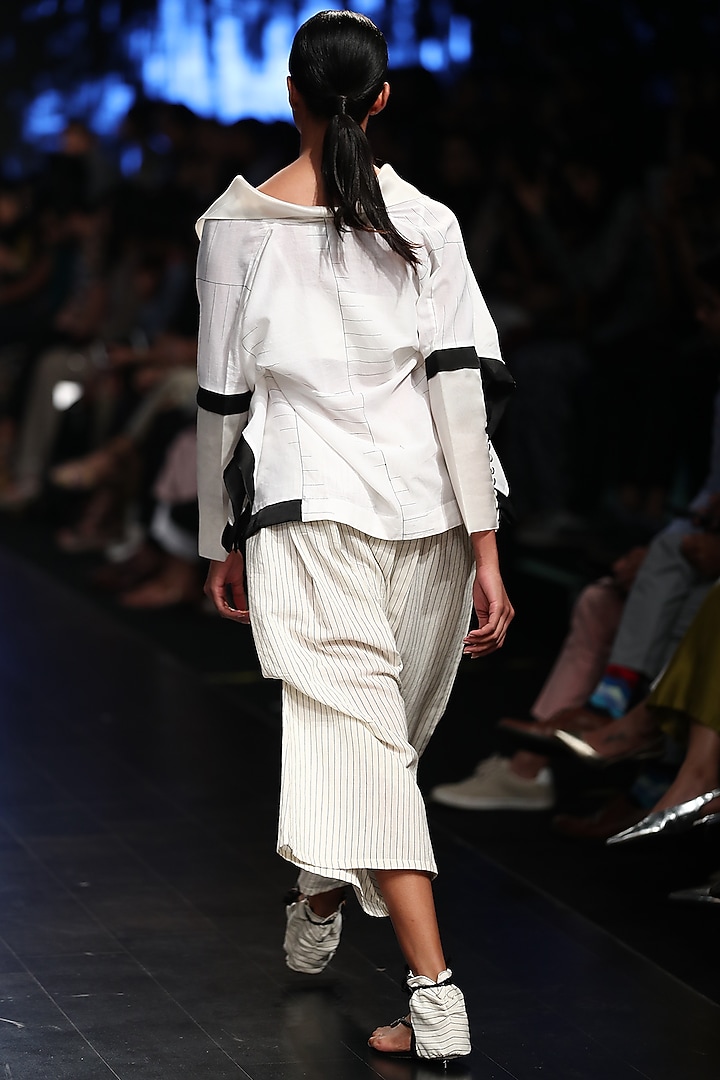 Off White Striped Baggy Trouser Pants by Sayantan Sarkar at Pernia's Pop Up Shop