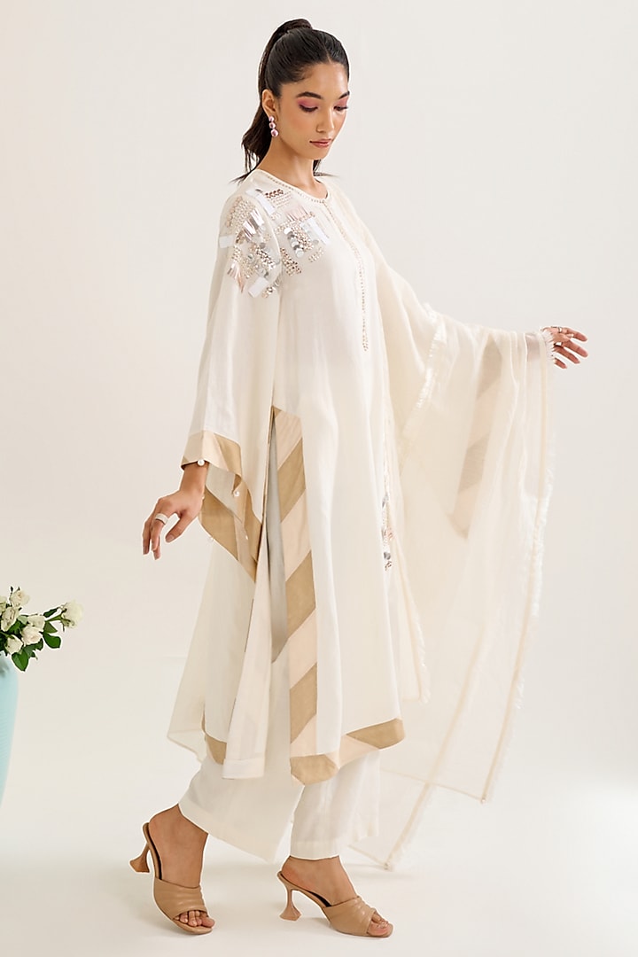 Ivory Linen Motif Hand Embellished Kurta Set by Siyona By Ankurita at Pernia's Pop Up Shop