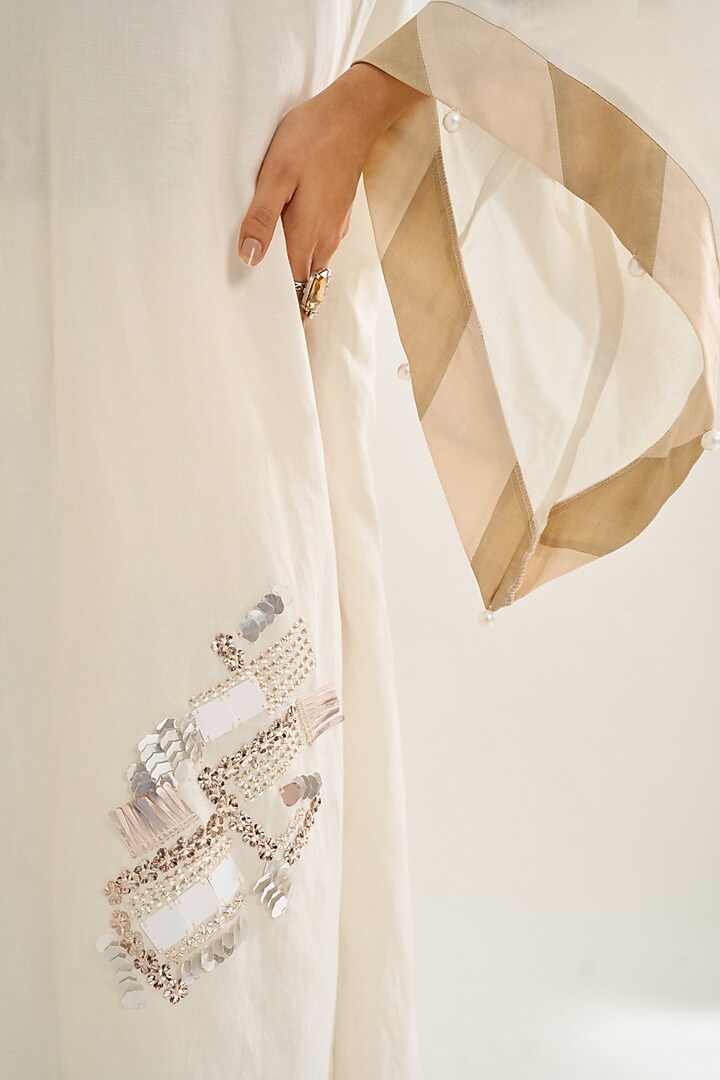 Ivory Linen Motif Hand Embellished Kurta Set by Siyona By Ankurita at Pernia's Pop Up Shop