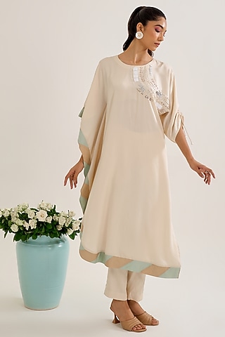 Ivory Satin Hand Embellished Asymmetric Kurta Set by Siyona By Ankurita