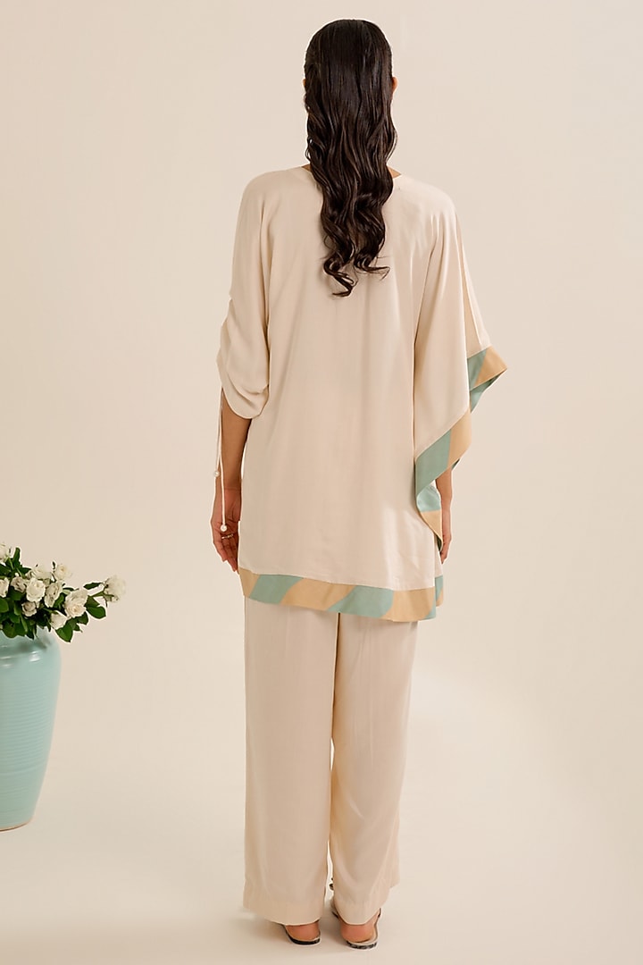 Ivory Satin Hand Embellished Co-Ord Set by Siyona By Ankurita at Pernia's Pop Up Shop