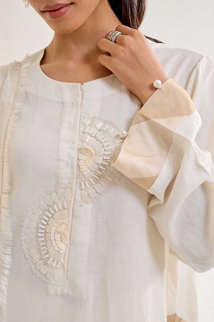 Ivory Linen Hand Embellished Kurta Set by Siyona By Ankurita at Pernia's Pop Up Shop
