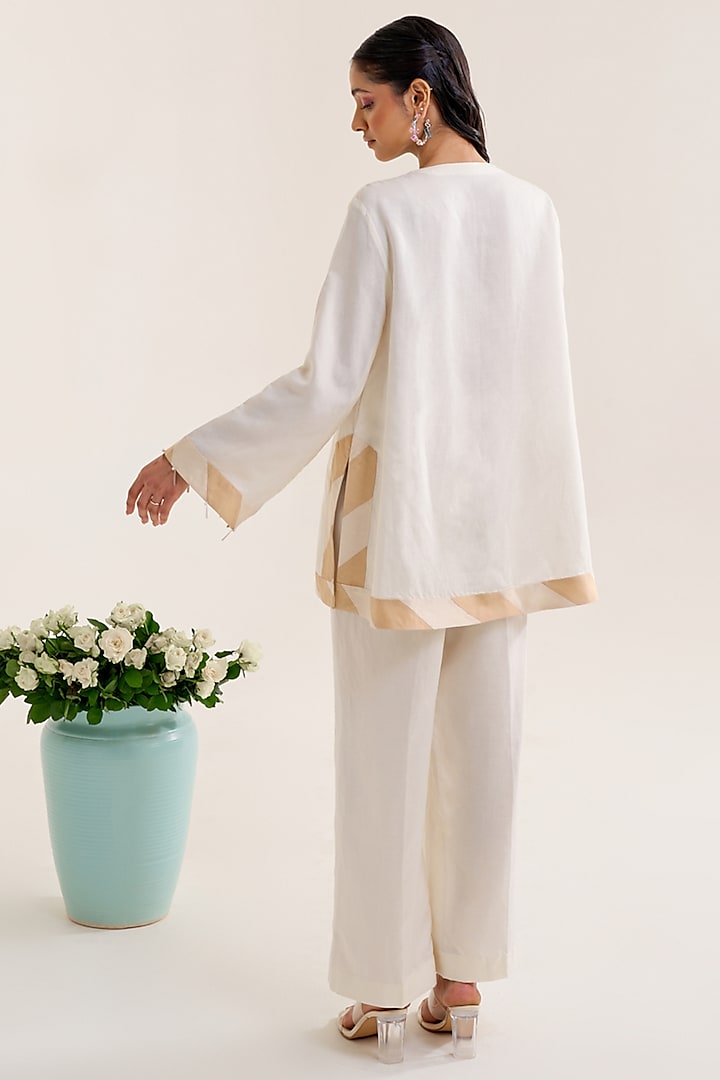 Ivory Linen Hand Embellished Tunic Set by Siyona By Ankurita at Pernia's Pop Up Shop