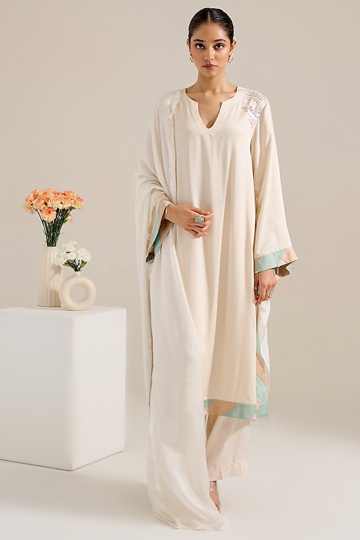 Ivory Satin Hand Embellished Kurta Set by Siyona By Ankurita at Pernia's Pop Up Shop