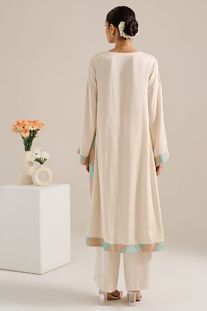 Ivory Satin Hand Embellished Kurta Set by Siyona By Ankurita at Pernia's Pop Up Shop