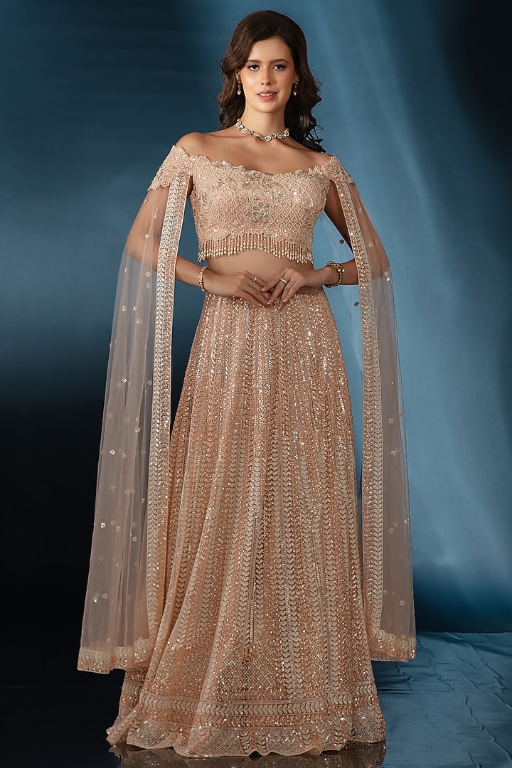 Nude Tulle Sequin Embroidered Wedding Lehenga Set by Saaj By Ankita at Pernia's Pop Up Shop