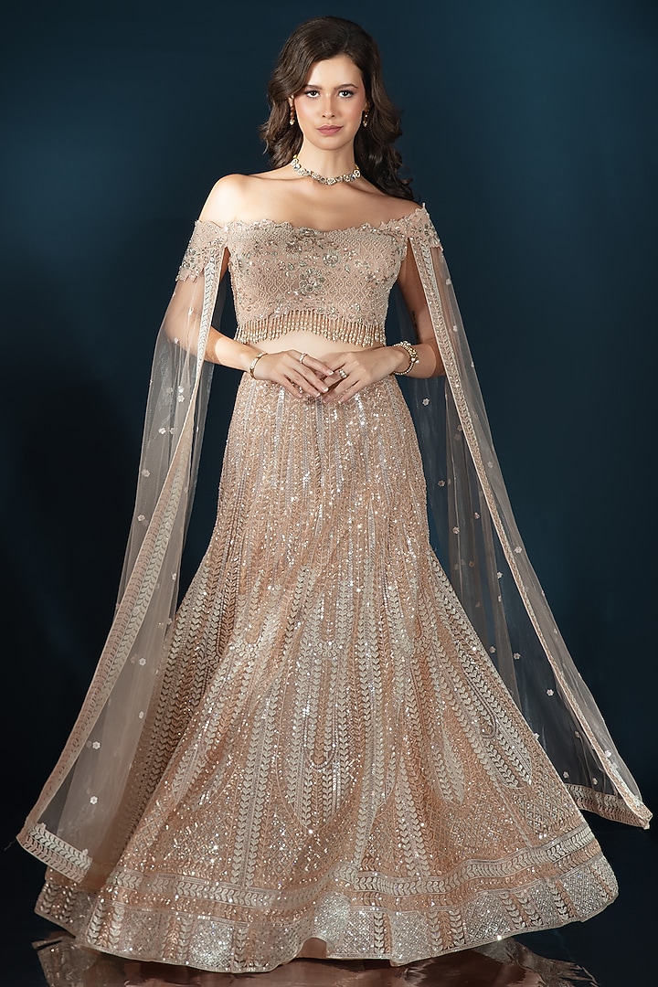 Nude Tulle Sequin Embroidered Wedding Lehenga Set by Saaj By Ankita at Pernia's Pop Up Shop