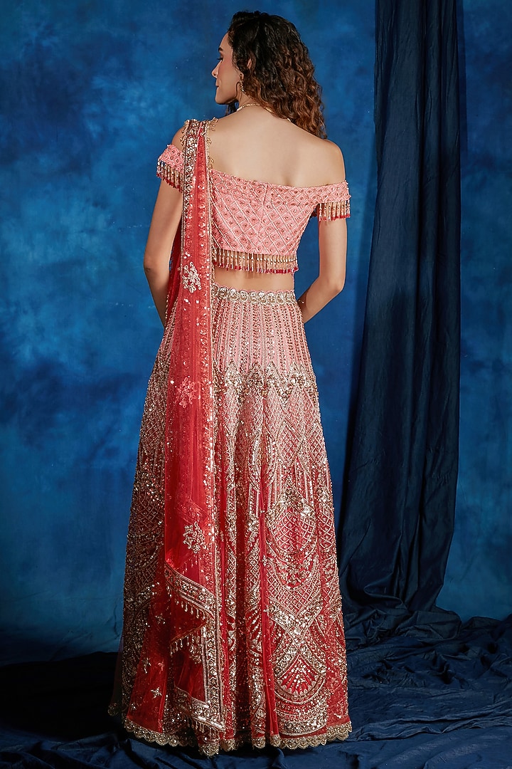 Coral Red Tulle Sequin Embroidered Wedding Lehenga Set by Saaj By Ankita at Pernia's Pop Up Shop