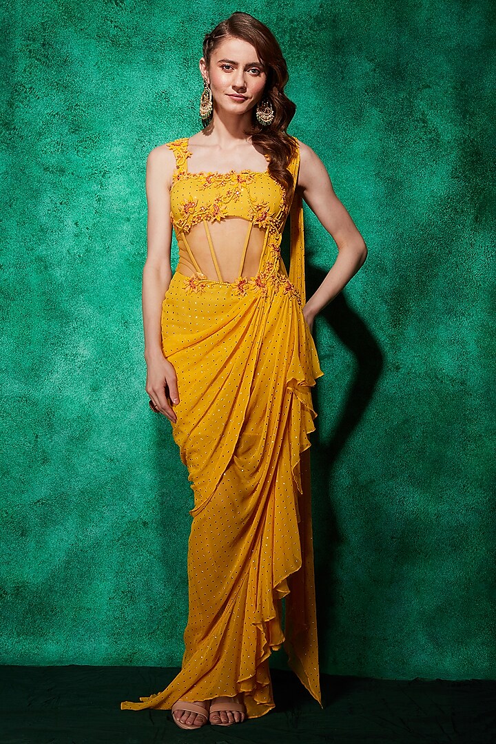 Mustard Mukaish Georgette Floral Motifs And Mirror Embroidered Corset Gown Saree by Saaj By Ankita