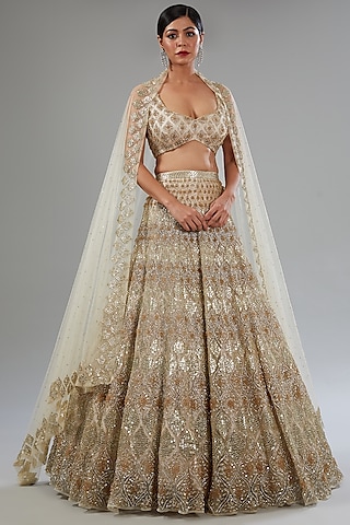 Ivory Net Sequins Embroidered Lehenga Set by Surabhi Chopra