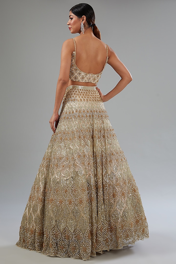 Ivory Net Sequins Embroidered Bridal Lehenga Set by Surabhi Chopra at Pernia's Pop Up Shop