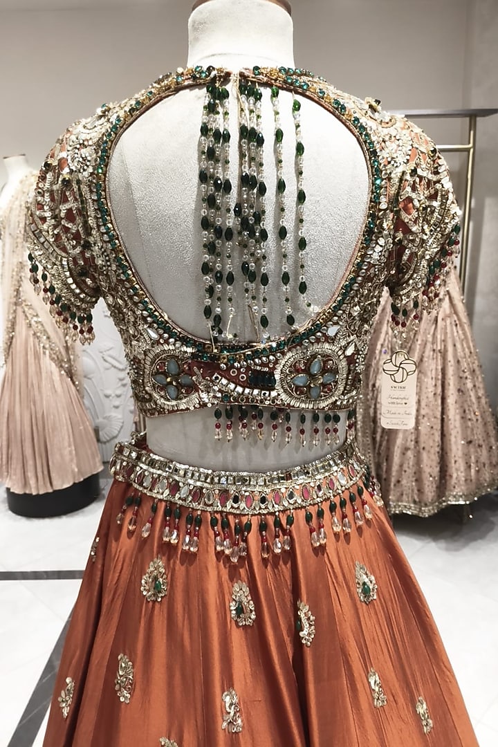 Rust Tissue & Polyester Hand Embellished Bridal Lehenga Set by Swish By dolcy and Simran at Pernia's Pop Up Shop