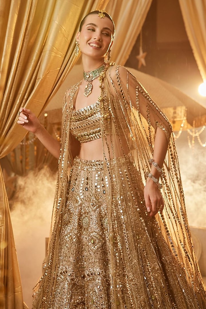 Golden Tissue Hand Embellished Bridal Lehenga Set by Swish By dolcy and Simran at Pernia's Pop Up Shop