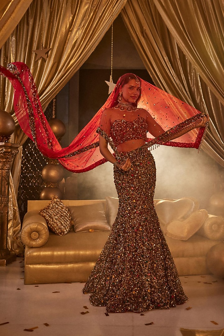 Deep Red Net Hand Embellished Bridal Lehenga Set by Swish By dolcy and Simran at Pernia's Pop Up Shop