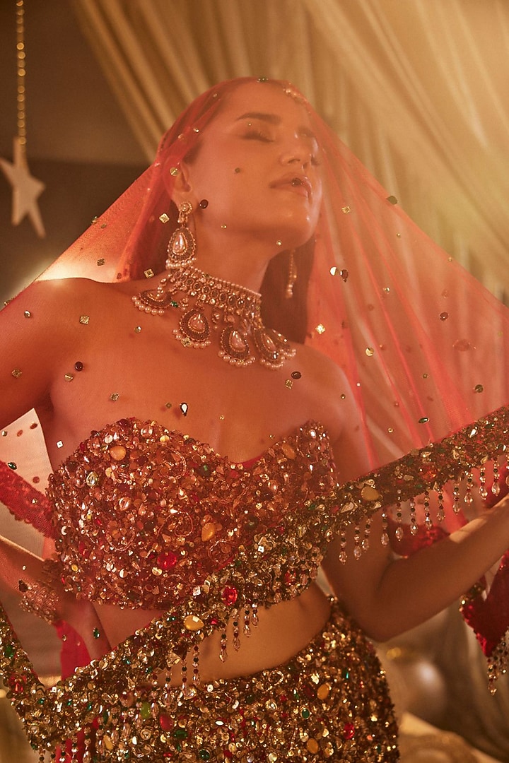 Deep Red Net Hand Embellished Bridal Lehenga Set by Swish By dolcy and Simran at Pernia's Pop Up Shop