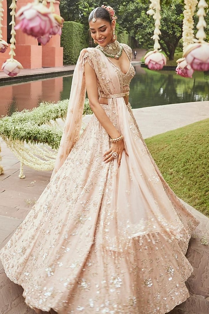 Blush Pink Satin Organza Hand Embellished Bridal Lehenga Set by Swish By dolcy and Simran at Pernia's Pop Up Shop