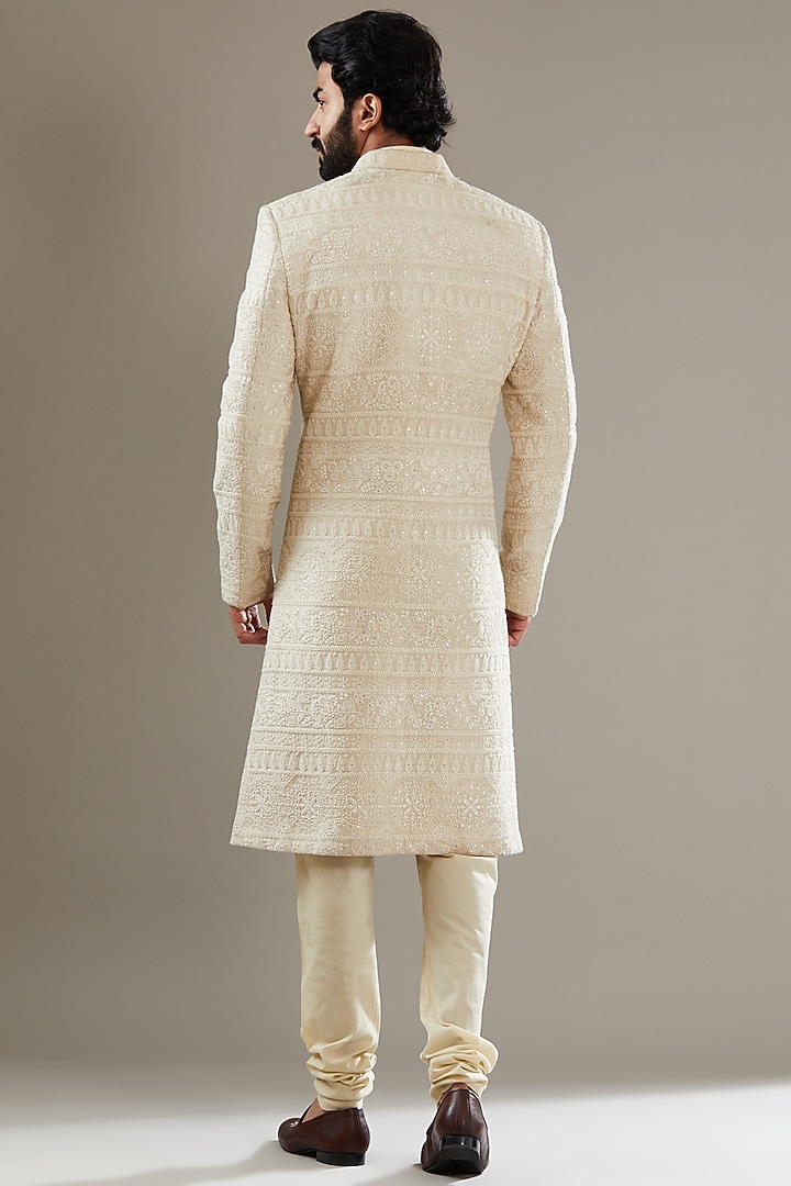 Ivory Self Embroidered Fabric Wedding Sherwani Set by SBJ at Pernia's Pop Up Shop