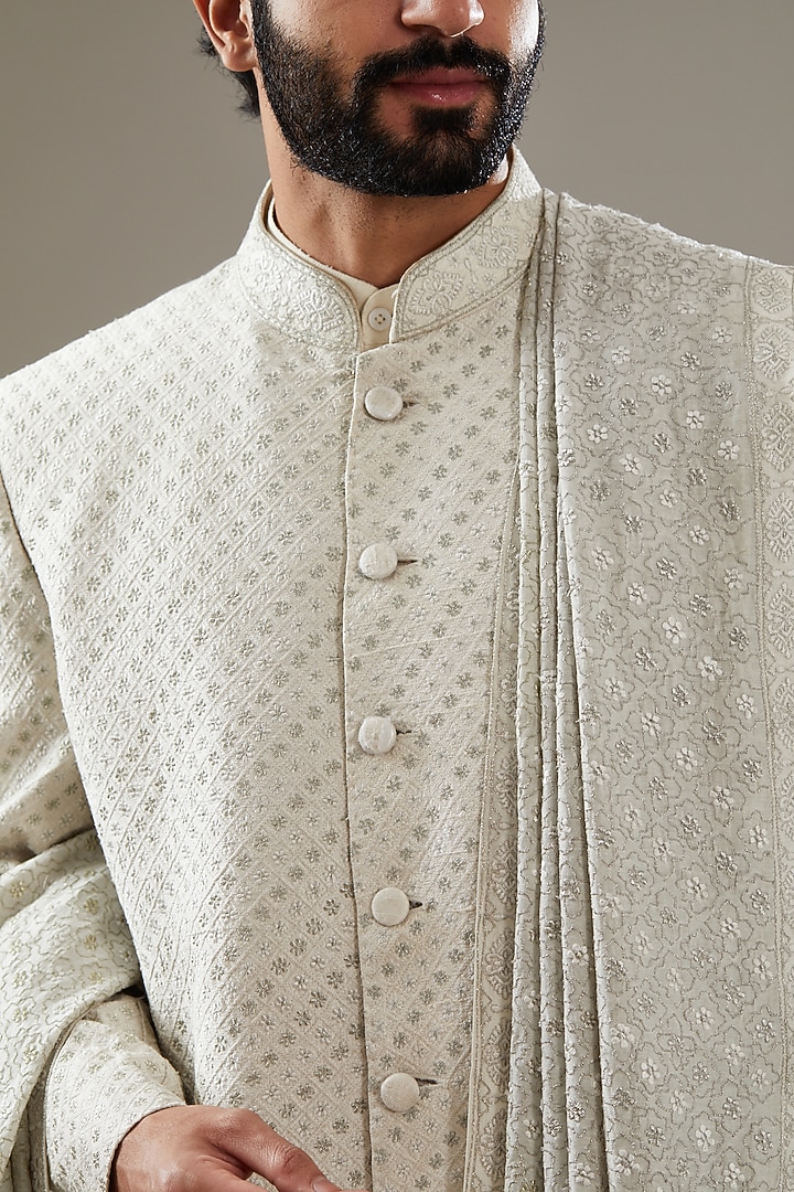 Off-White Raw Silk Embroidered Groom Sherwani Set by SBJ at Pernia's Pop Up Shop