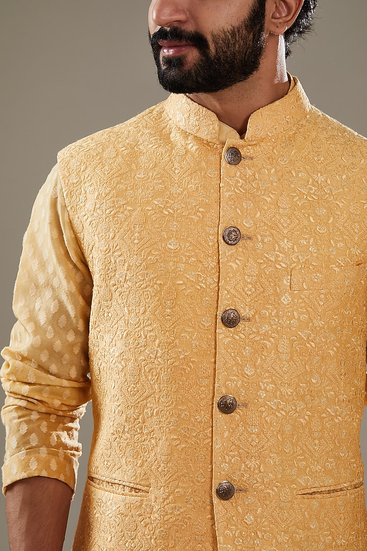 Mustard Silk Resham Embroidered Bundi Jacket Set by SBJ at Pernia's Pop Up Shop