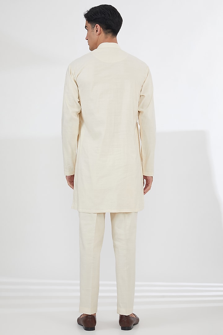 Light Peach Pink Raw Silk Thread Embroidered Wedding Sherwani Set by SBJ at Pernia's Pop Up Shop