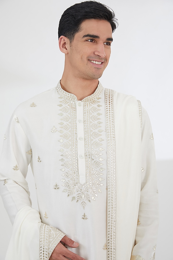 Off-White Dupion Silk Leatherite Work Kurta Set by SBJ at Pernia's Pop Up Shop