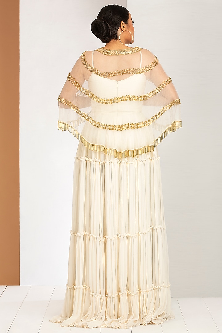 Pearl White Tiered Engagement Gown With Cape by Siyaahi by Poonam & Rohit at Pernia's Pop Up Shop