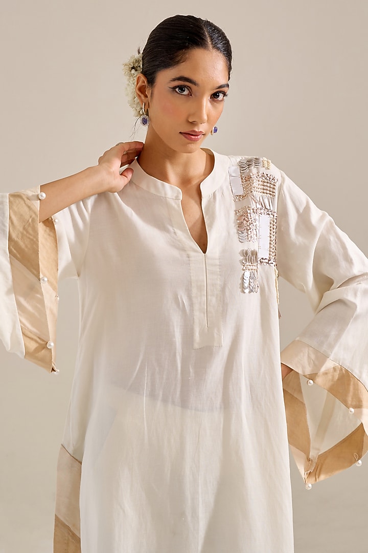 Ivory Linen Motif Hand Embellished Kurta Set by Siyona By Ankurita at Pernia's Pop Up Shop