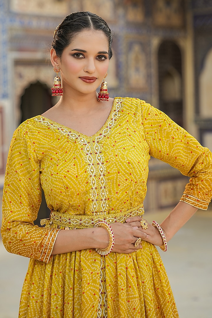 Yellow Chinon Silk Bandhani Printed & Mirror Work Gathered Gown by Scakhi Luxe at Pernia's Pop Up Shop