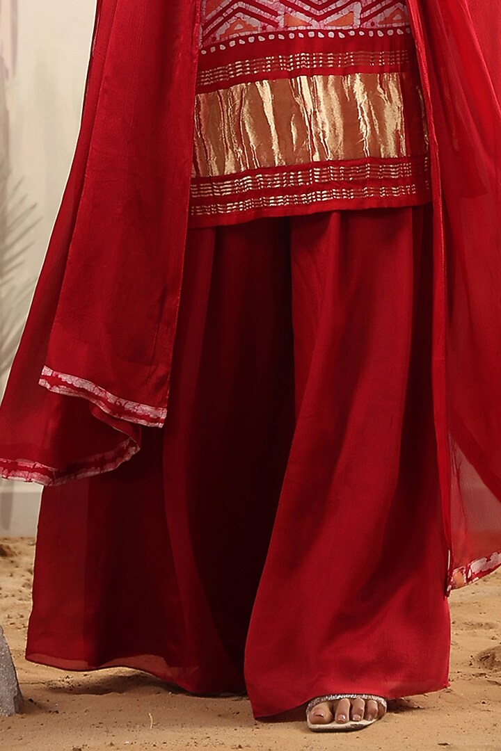 Red Georgette Tiered Party Wear Sharara Set by Scakhi Luxe at Pernia's Pop Up Shop
