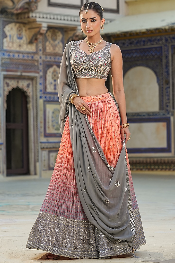 Peach Chinon Silk Bandhani Printed & Sequin Embellished Crushed Lehenga Set by Scakhi