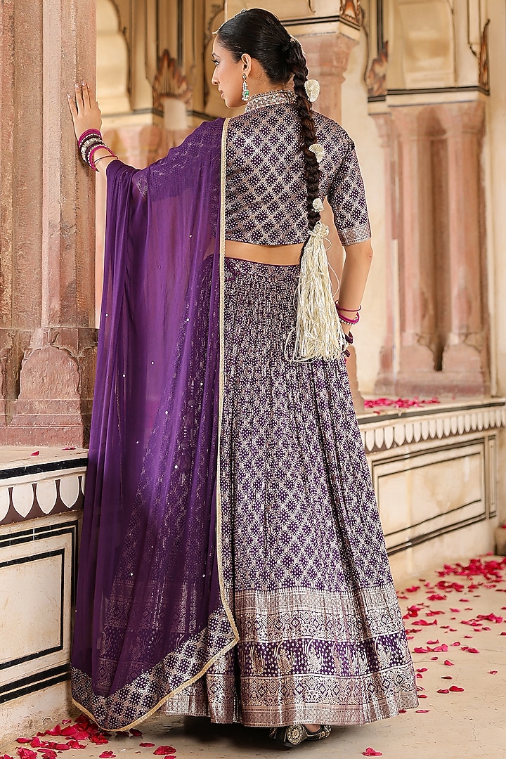 Purple Banarasi Silk Jacquard Bandhani Printed & Sequins Embellished Gathered Lehenga Set by Scakhi Luxe at Pernia's Pop Up Shop
