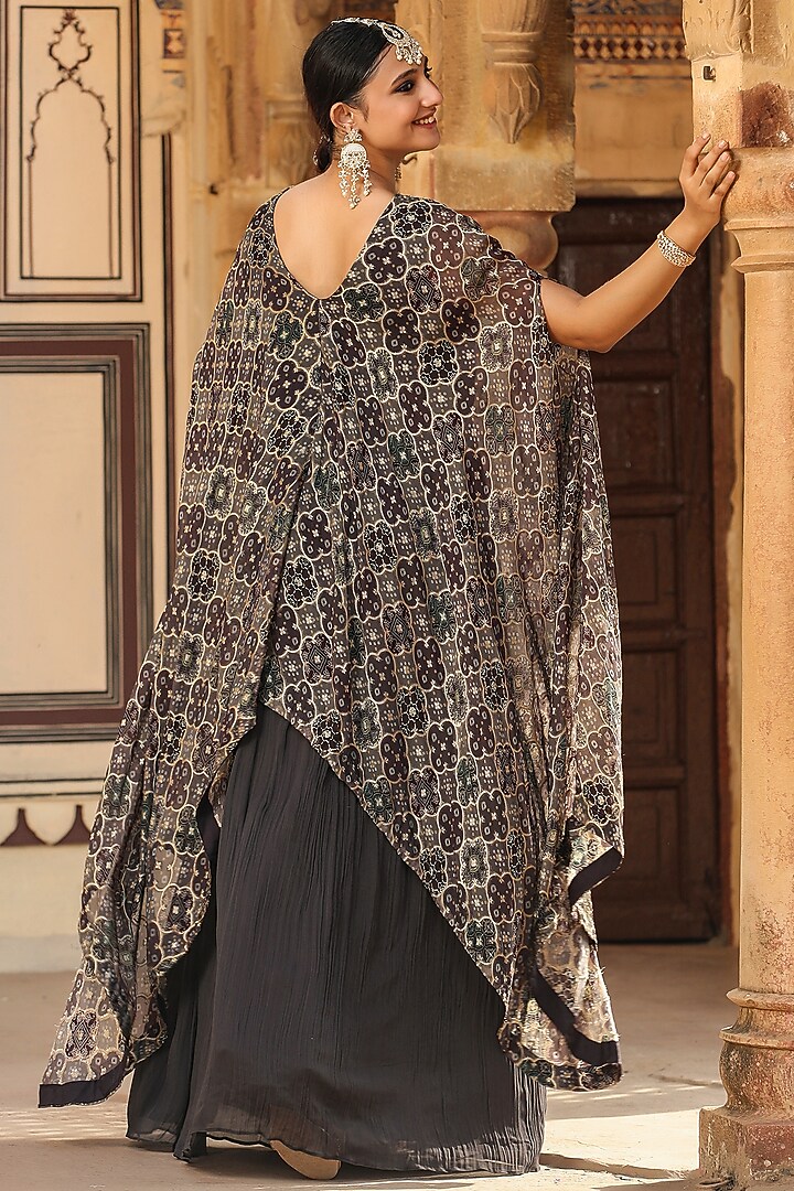 Grey Georgette Pleated Party Wear Gown With Attached Cape by Scakhi Luxe at Pernia's Pop Up Shop