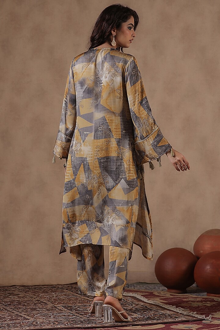 Mustard Satin Paisley Printed Asymmetric Kurta Set by Scakhi Luxe at Pernia's Pop Up Shop