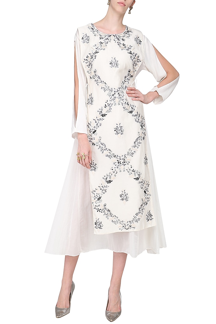 Off white asymmetrical embroidered tunic available only at Pernia's Pop Up Shop.