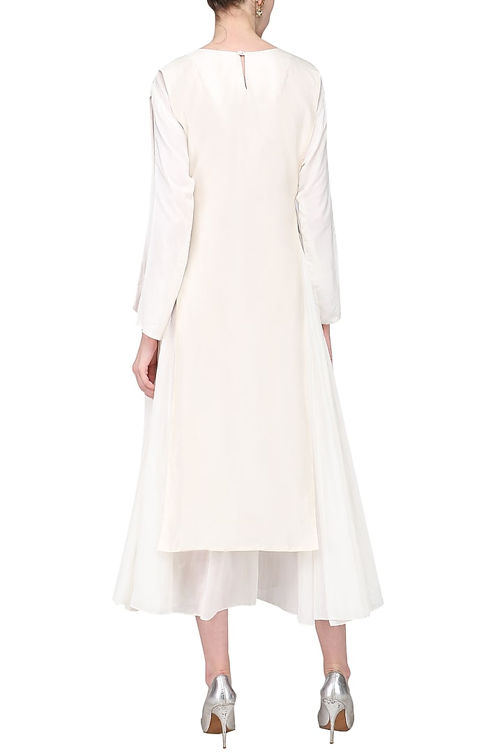 Off white asymmetrical embroidered tunic available only at Pernia's Pop Up Shop.