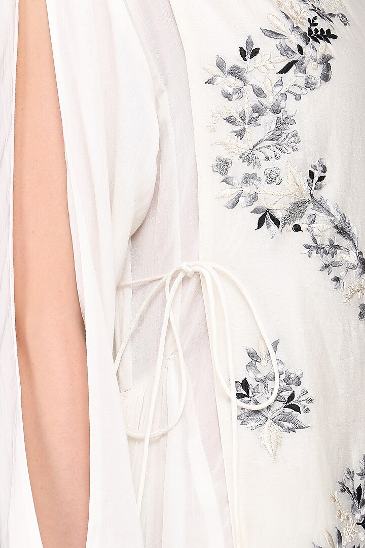 Off white asymmetrical embroidered tunic available only at Pernia's Pop Up Shop.