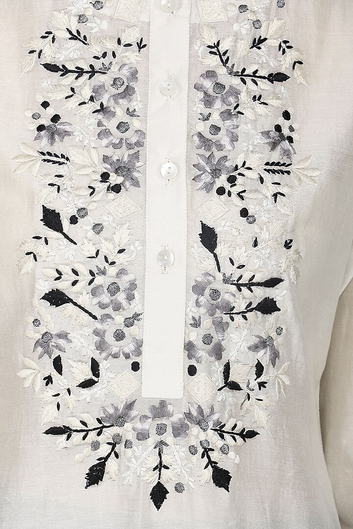 Off white embroidered kurta with churidar pants available only at Pernia's Pop Up Shop.