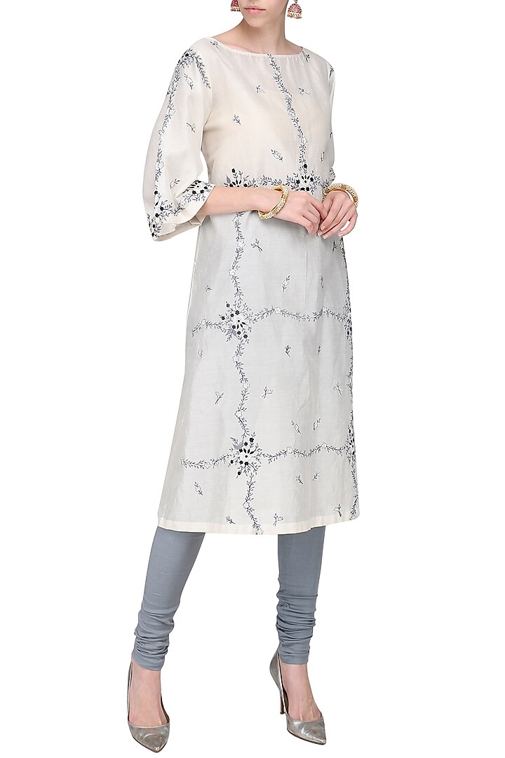 Off white embellished kurta with churidar pants available only at Pernia's Pop Up Shop.