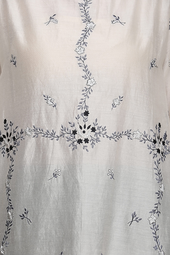 Off white embellished kurta with churidar pants available only at Pernia's Pop Up Shop.