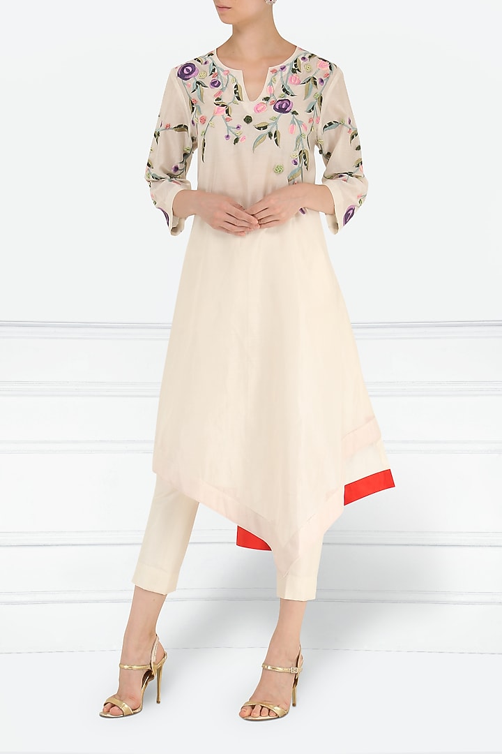Off White Embroidered Asymmetrical Kurta with Churidar Pants available only at Pernia's Pop Up Shop.