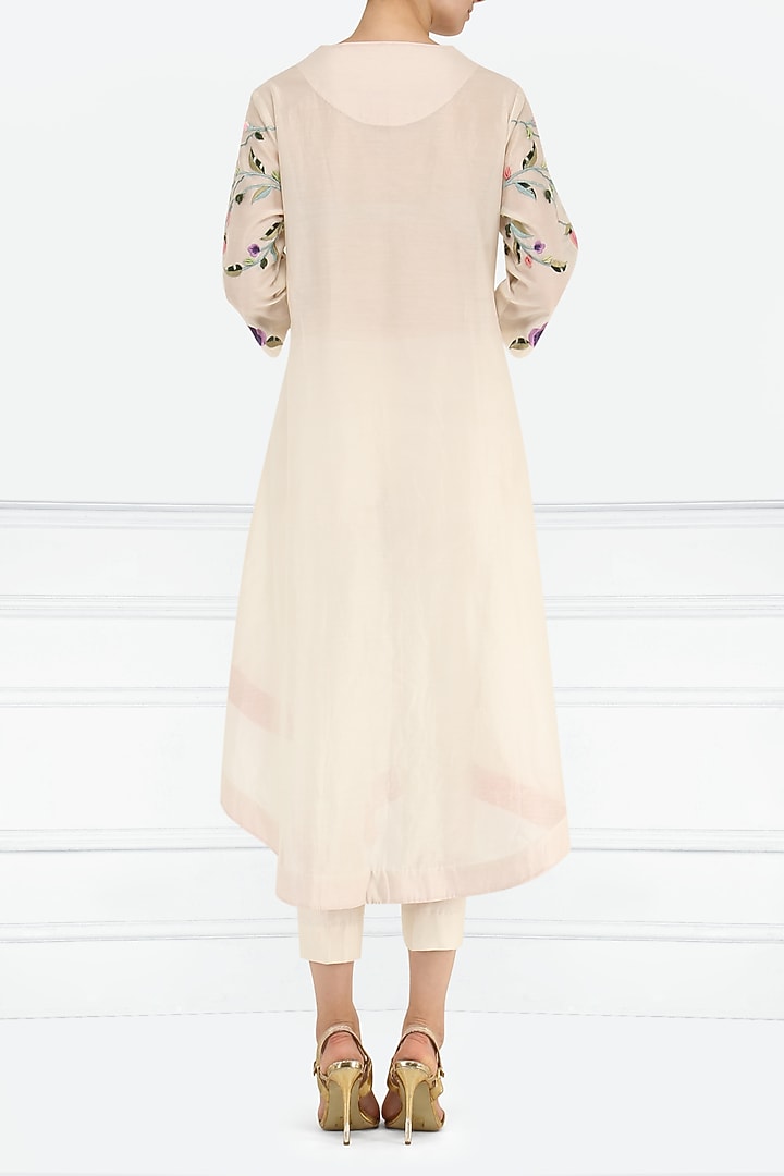 Off White Embroidered Asymmetrical Kurta with Churidar Pants available only at Pernia's Pop Up Shop.
