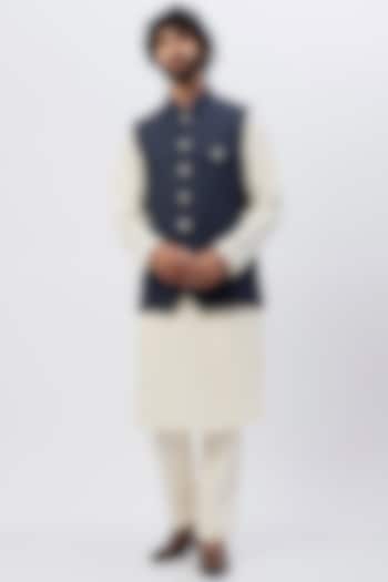 Off-White Silk Kurta Set With Bundi Jacket by SHIRRIN DESIGN CO. MEN