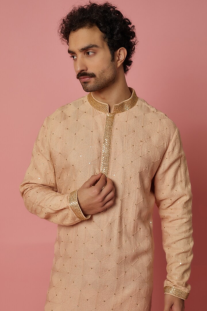 Salmon Pink Silk Thread Embroidered Kurta Set by SHIRRIN DESIGN CO. MEN at Pernia's Pop Up Shop