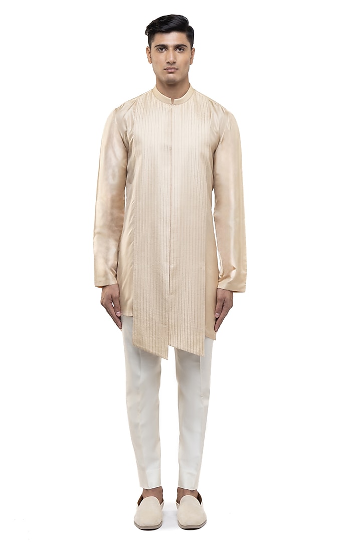 Beige Silk Asymmetric Pleated Kurta Set by SDS by KUSHAL SHAH at Pernia's Pop Up Shop