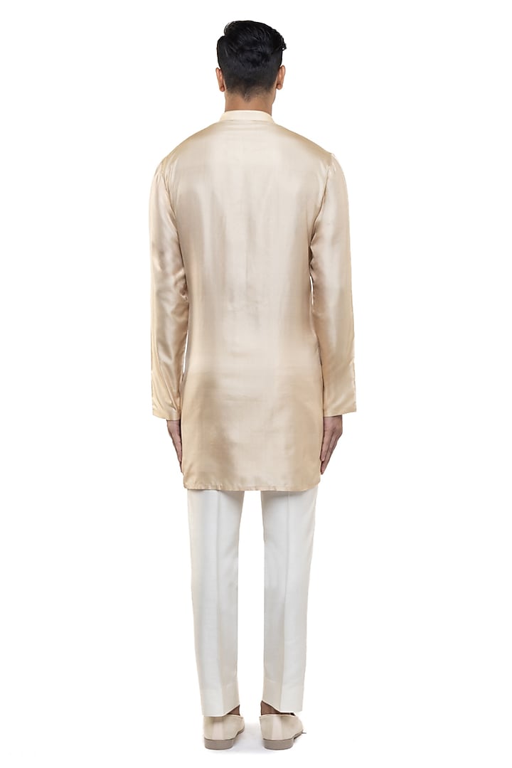 Beige Silk Asymmetric Pleated Kurta Set by SDS by KUSHAL SHAH at Pernia's Pop Up Shop