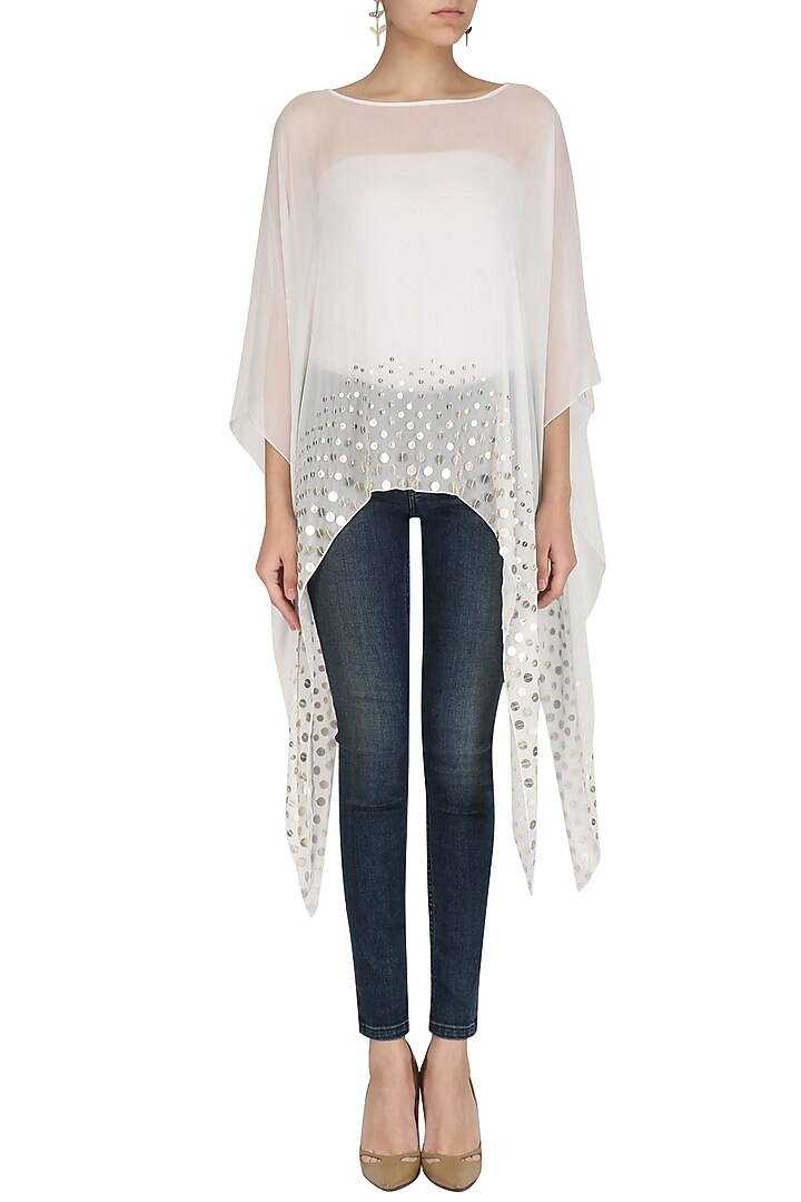 White coin embellished asymmetrical cape available only at Pernia's Pop Up Shop.