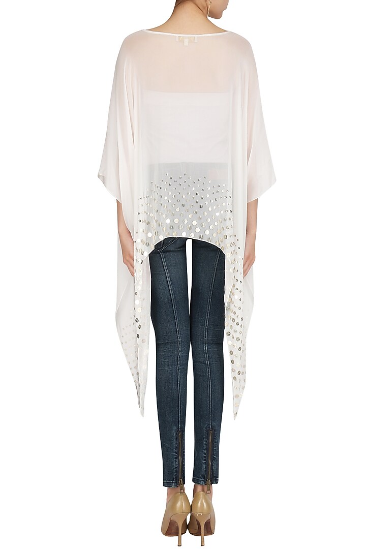 White coin embellished asymmetrical cape available only at Pernia's Pop Up Shop.
